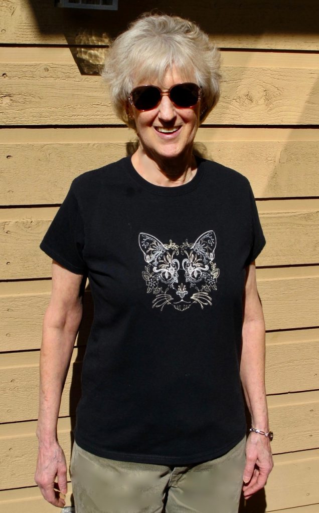 Terri wearing cat design T-shirt