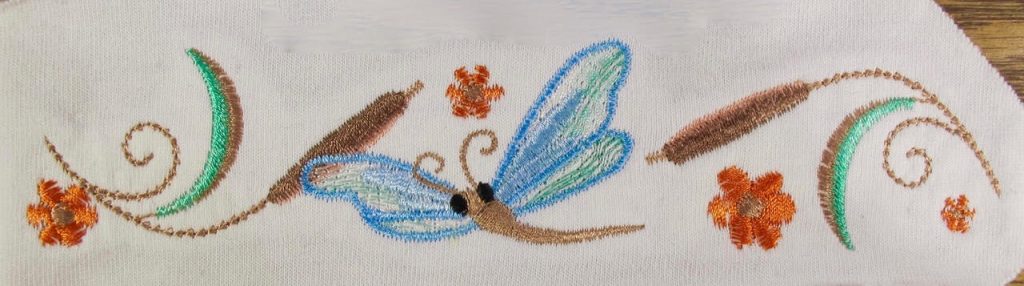 Dragonfly And Cattails